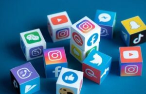 How To Use Social Media Designer To Get More Followers Person designing social media graphics on a computer