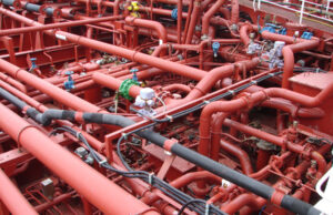Ensuring Integrity: Best Practices for Process Piping Systems Maintenance Industrial piping system with valves and pipework in a processing plant