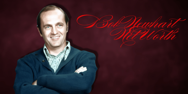 Bob Newhart smiling in a formal suit and tie