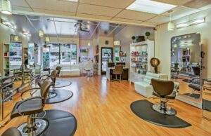 Top Beauty Salon Marketing Agency in Dubai – Grow Your Brand Today Beauty salon interior with styling stations in Dubai